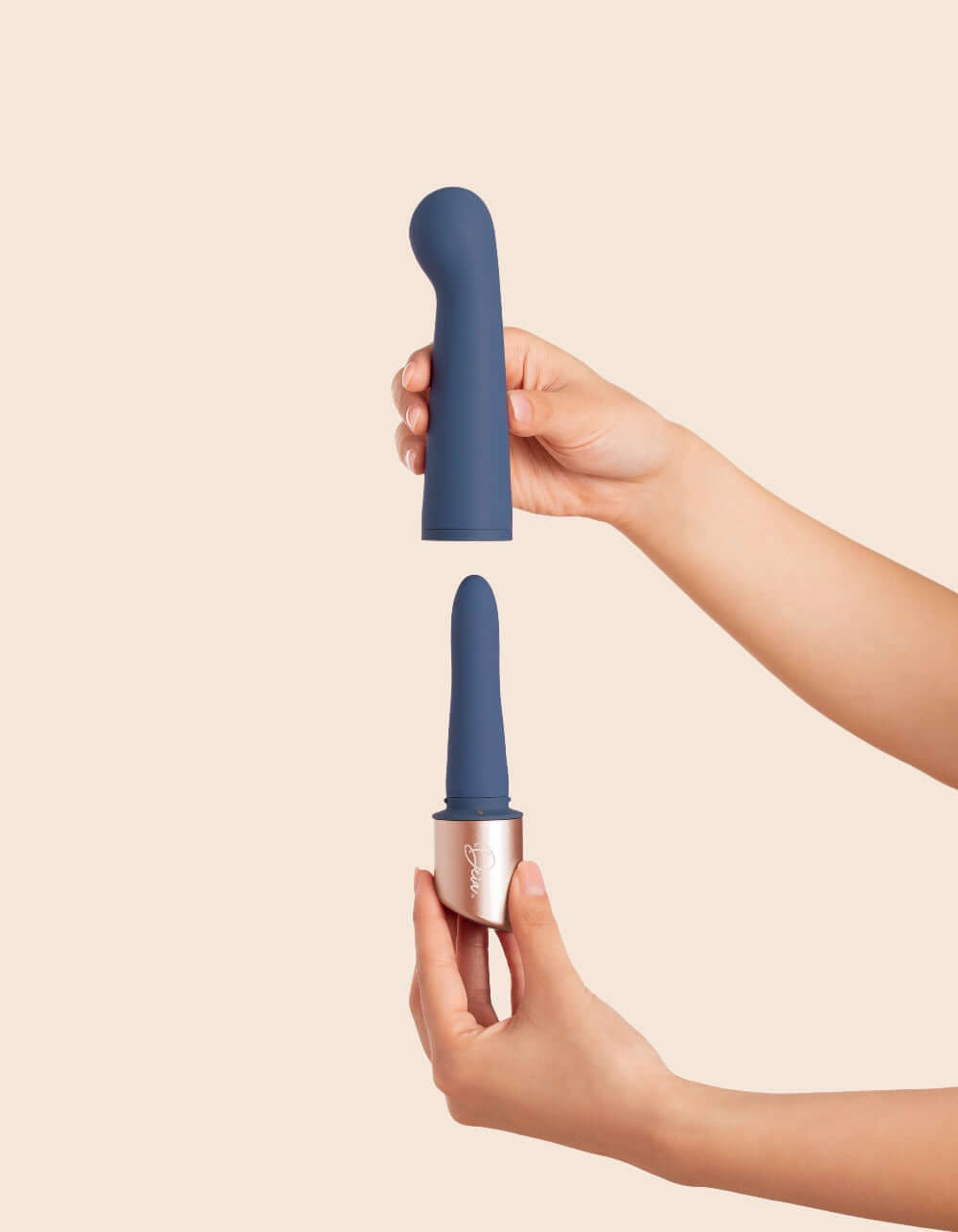 The Couple vibrator showing both sections of the vibrator being held after separated for size comparison