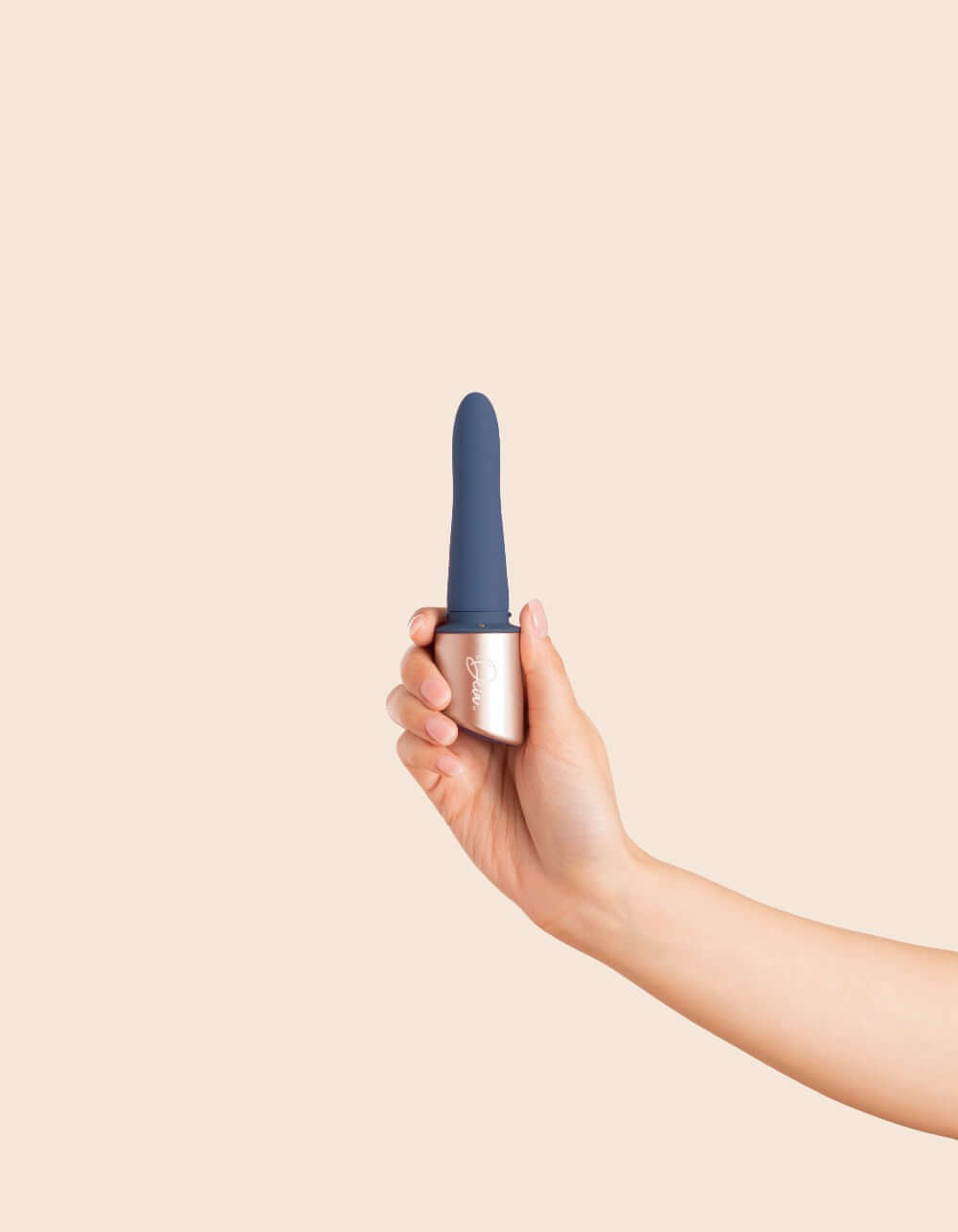 Smaller section of the Couple vibrator being held in female hand