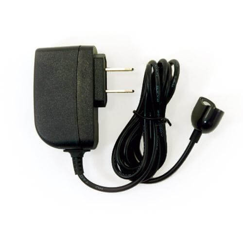 Je Joue Universal Charger from Tickle-Boxx for pleasure toys, featuring a sleek design with a black cord and plug.