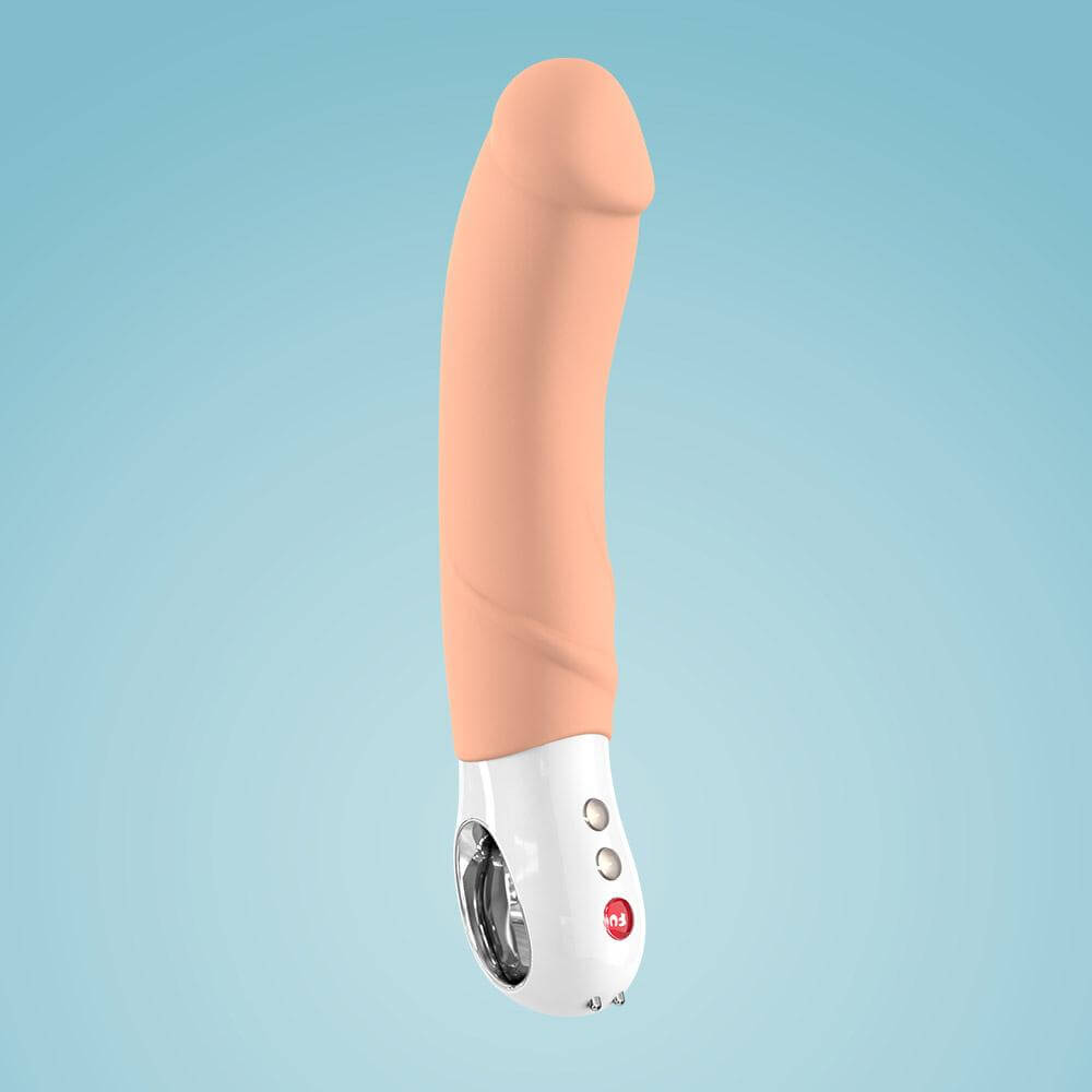  THE BIG BOSS: The Ultimate XL Vibrator by Fun Factory - skin tone on baby blue background