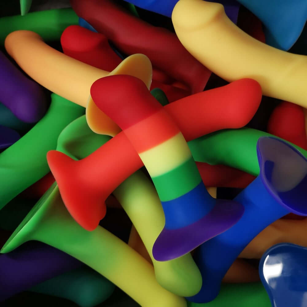 image of multiple colored dildos-rainbow dildo cornucopia 