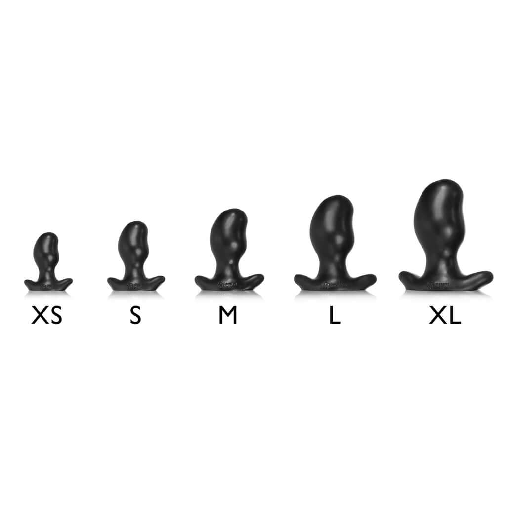 Size comparison of ERGO buttplugs from XS to XL, showing ergonomic design and diverse sizes in black material